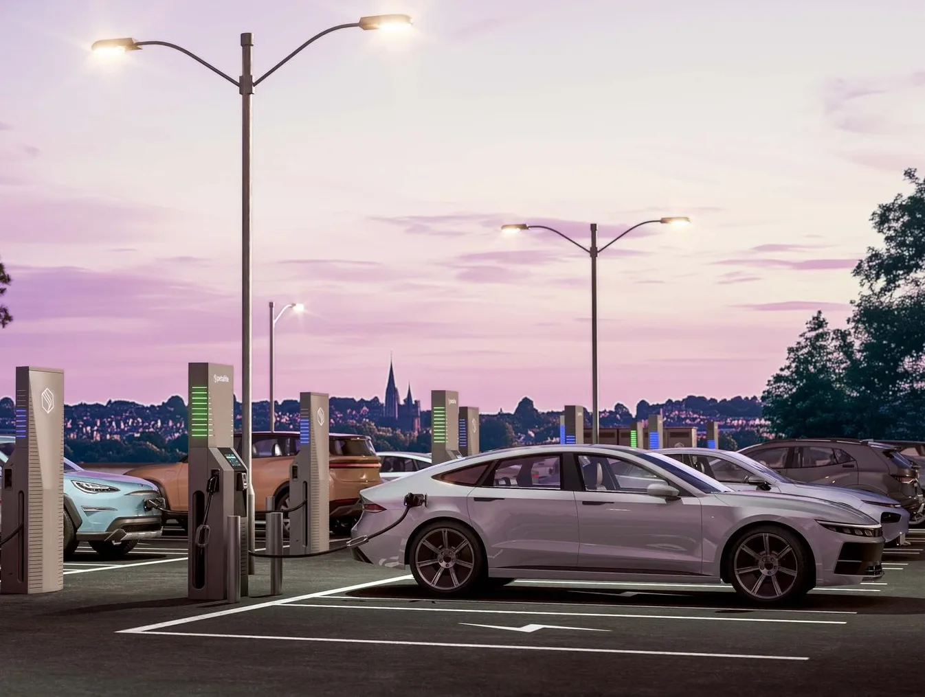 Row of Petalite EV charging stations in a car park at dusk, with several electric vehicles plugged in and charging.