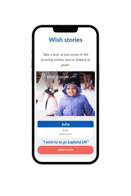 A phone showing the Make-A-Wish UK "Wish stories" section, with Julia's granted wish to visit Lapland UK and her photo.
