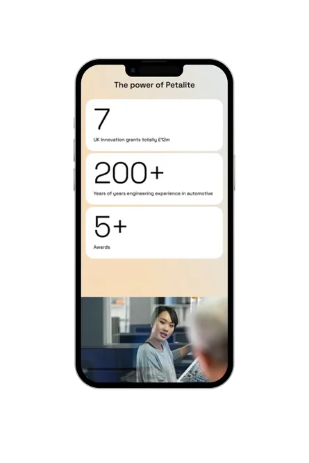 Petalite website mobile screen showing 'The power of Petalite' stats: 7 UK innovation grants totalling £12m, 200+ years of engineering experience in automotive, and 5+ awards, with an image of an engineer at a workbench below.
