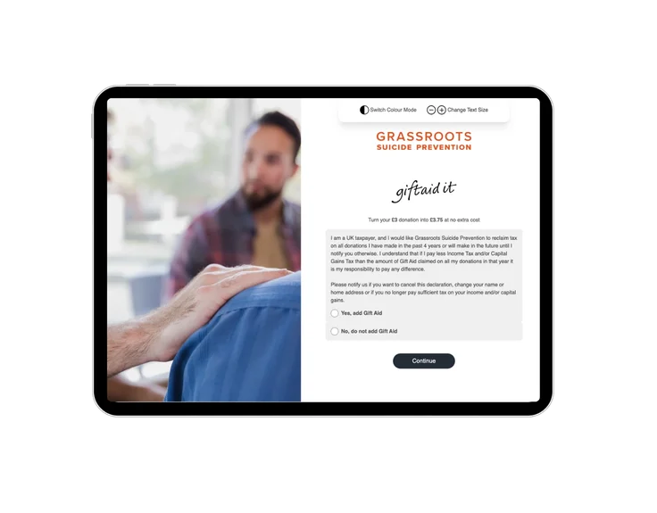 A phone device showing the Grassroots Suicide Prevention Gift Aid page.