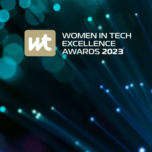 Women in Tech Excellence Awards 2023 logo over a blurred photo of fibre optic light trails.