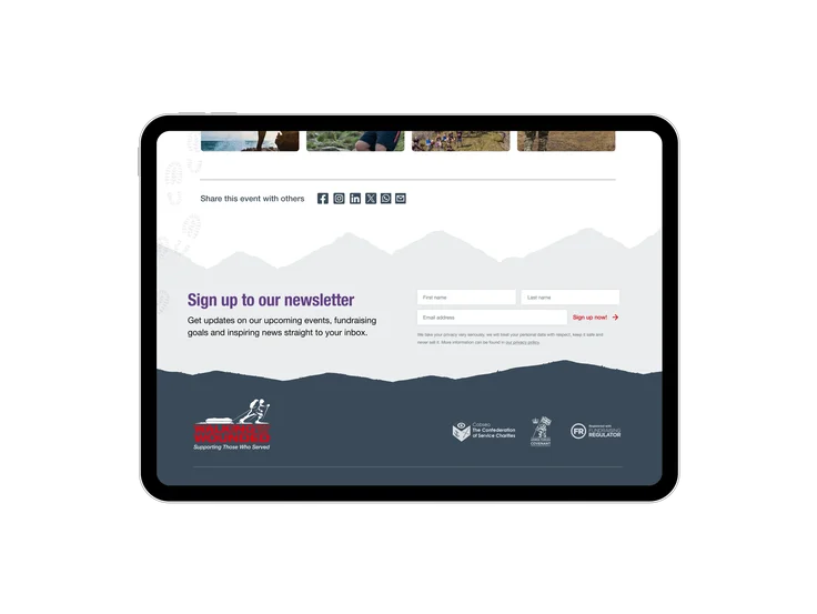A tablet showing the Walking With The Wounded footer, with a newsletter sign-up form and partner accreditation logos.