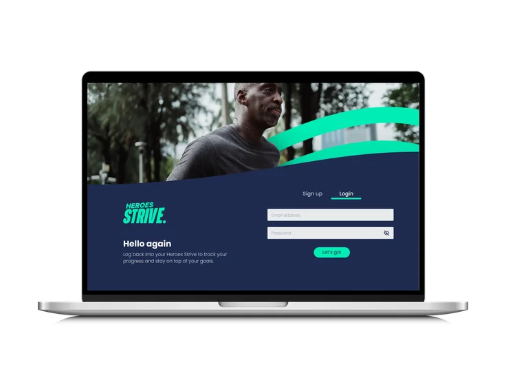 A laptop showing the Heroes Strive login page, with "Hello again" message, email and password fields, and a photo of a man exercising outdoors.