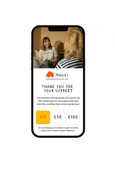 A phone device showing the Maggie's Cancer Centres donation page, with options to donate £15, £30 or £100 and supporting information with a thank you message.